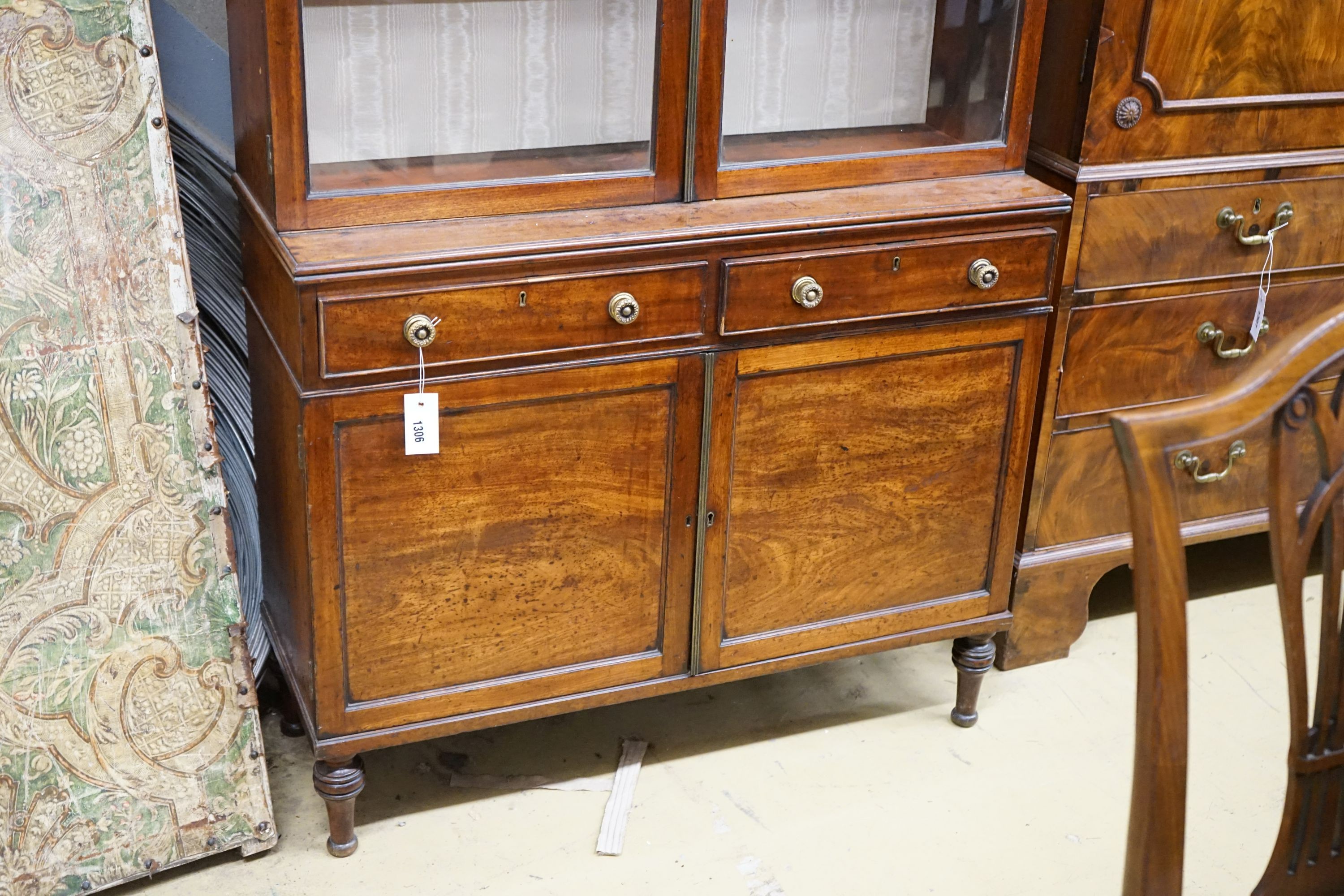 A small Regency glazed mahogany side cabinet, width 92cm, depth 33cm, height 147cm